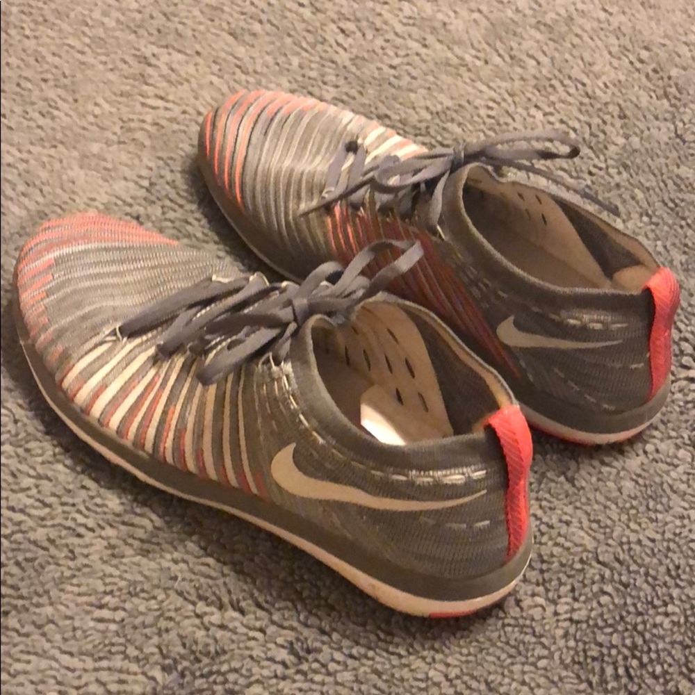 Nikes Womens Flyknit Orange and Grey Sneakers